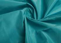 Ткань универсальная, синтетическая, тафта. Средней плотности, жестковата, не тянется, не просвечивается, очень хорошего качества. Раздел цвета - зеленый. 